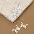 Faceted Gem And Butterfly Dangle Earrings